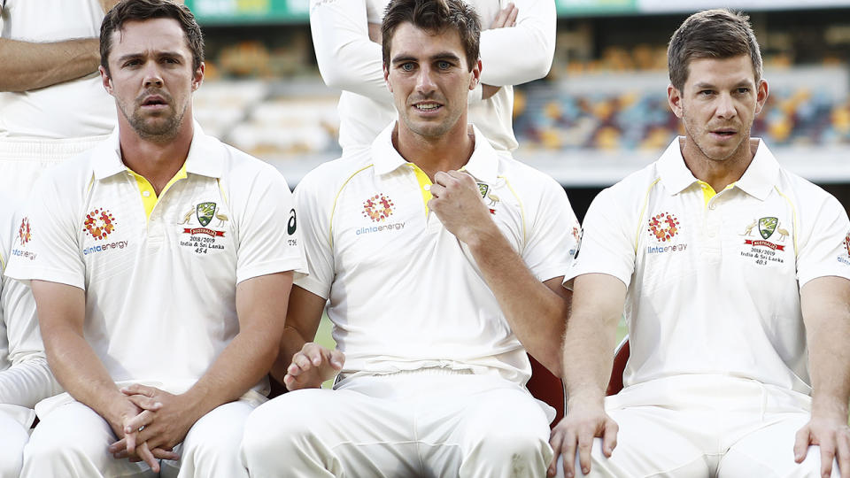 Travis Head, Pat Cummins and Tim Paine. (Photo by Ryan Pierse/Getty Images)