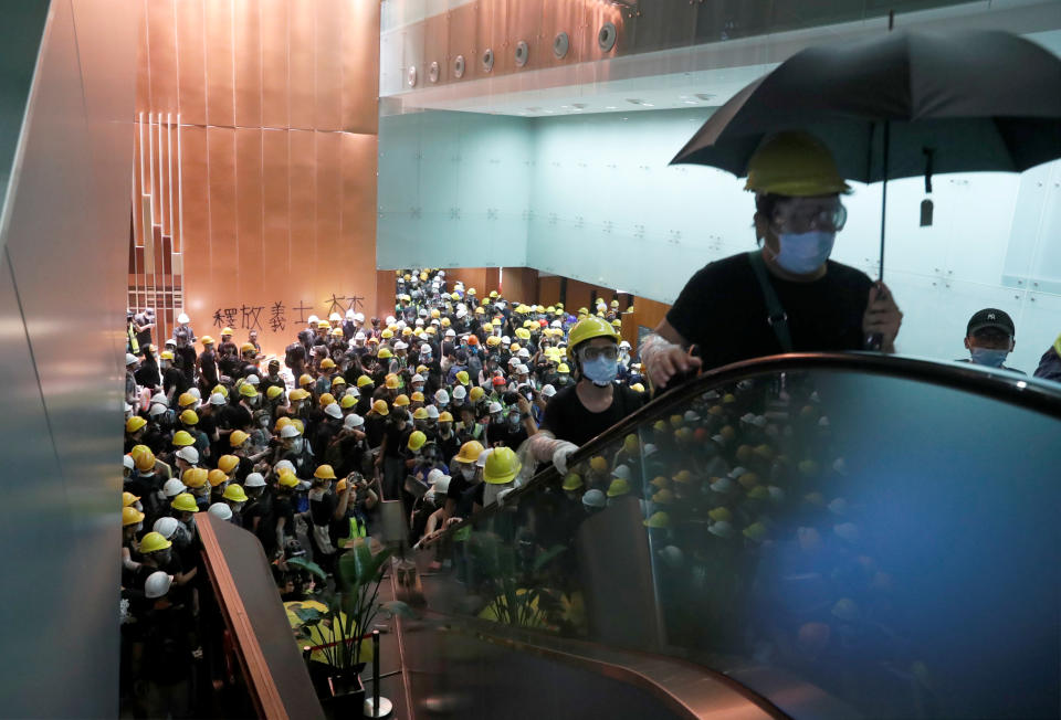 Protesters break into the Legislative Council building during the anniversary of Hong Kong's handover to China in Hong Kong, China July 1, 2019. (Photo: Tyrone Siu/Reuters)
