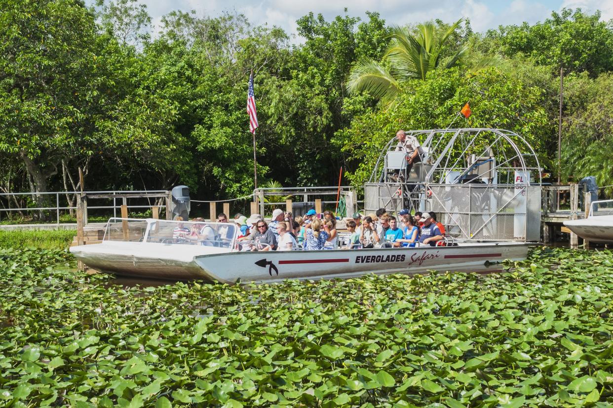 airboat full of tourists in Everglades National Park, Florida