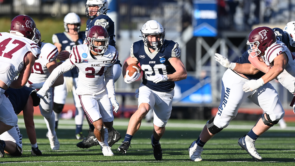 UNH running back Dylan Laube breaks free for a long gain during Saturday's 52-42 win over Fordham in the first round of the NCAA tournament. UNH will visit Holy Cross on Saturday in the second round.