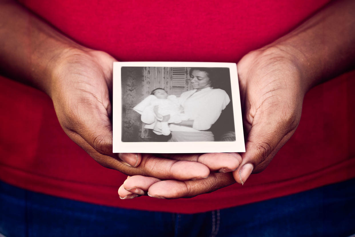 Photo of author at 3 weeks old held by their mother Photo illustration by Salon/Randall Horton/Getty Images