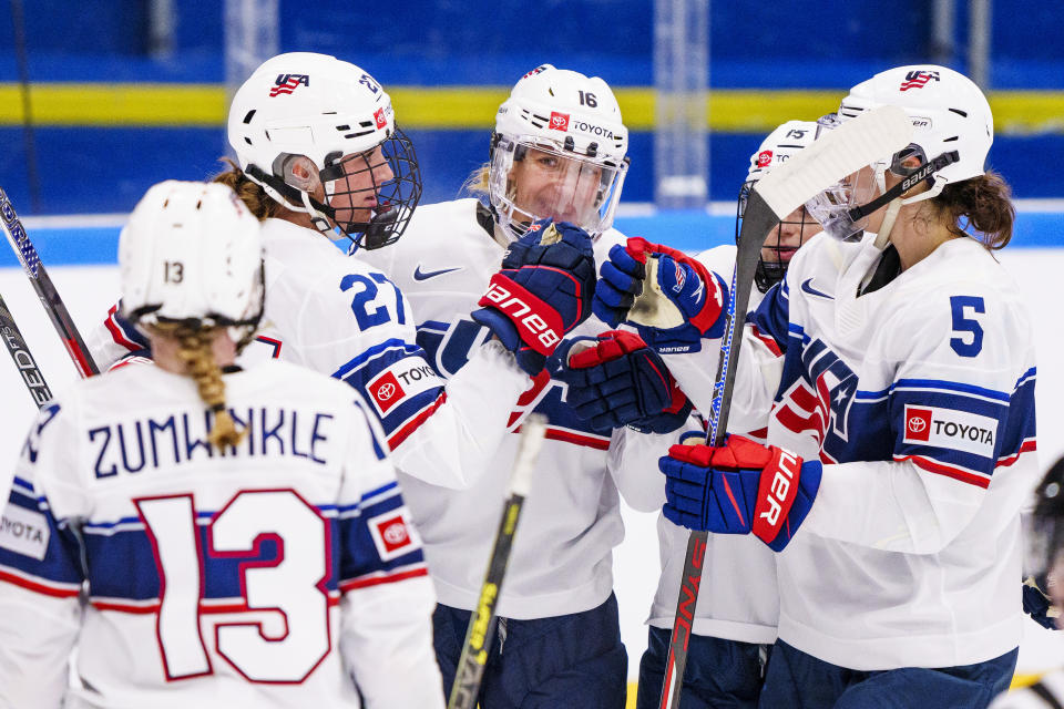 USA celebrate Hayley Scamurras 0-4 goal during the IIHF World Championship Women's ice hockey match between Japan and USA in Herning, Denmark, Thursday, Aug. 25, 2022. (Bo Amstrup/Ritzau Scanpix via AP)