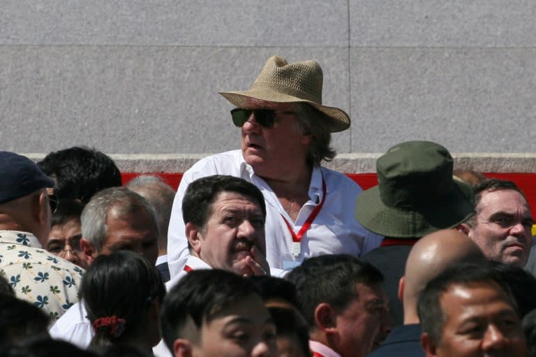 French actor Gerard Depardieu was seated in a section below the main tribune during the anniversary parade