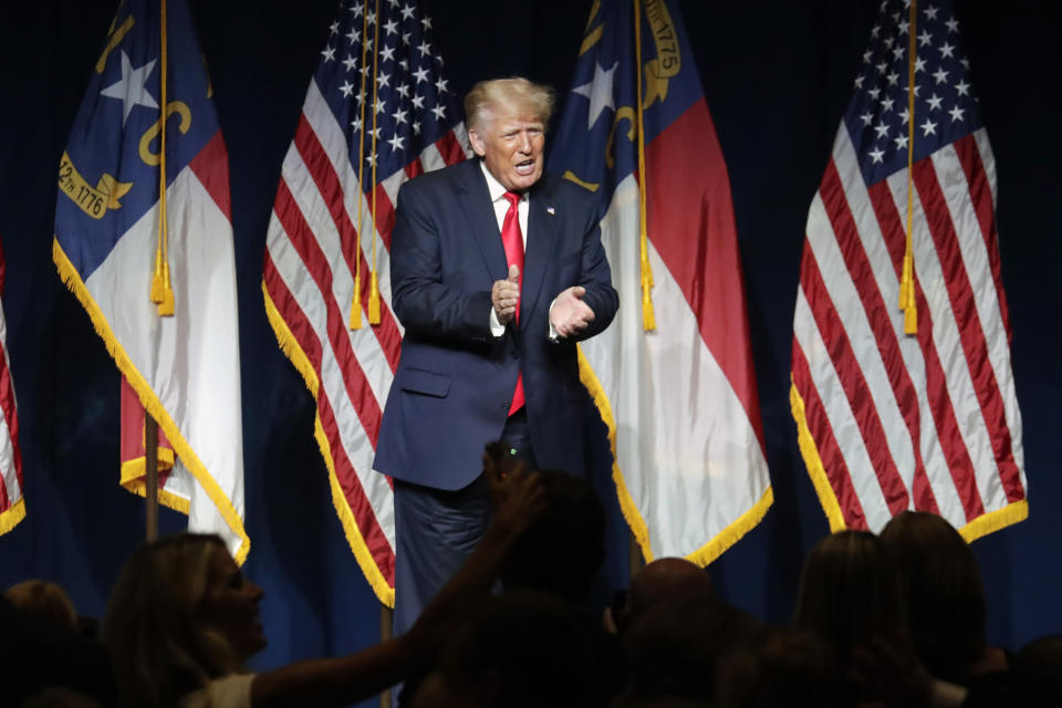 Former President Donald Trump applauds the crowd after he speaks at the North Carolina Republican Convention Saturday, June 5, 2021, in Greenville, N.C. (AP Photo/Chris Seward)