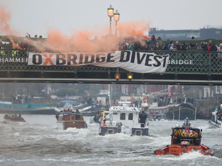 Boat Race disrupted by protesters demanding Oxford and Cambridge divest from fossil fuels