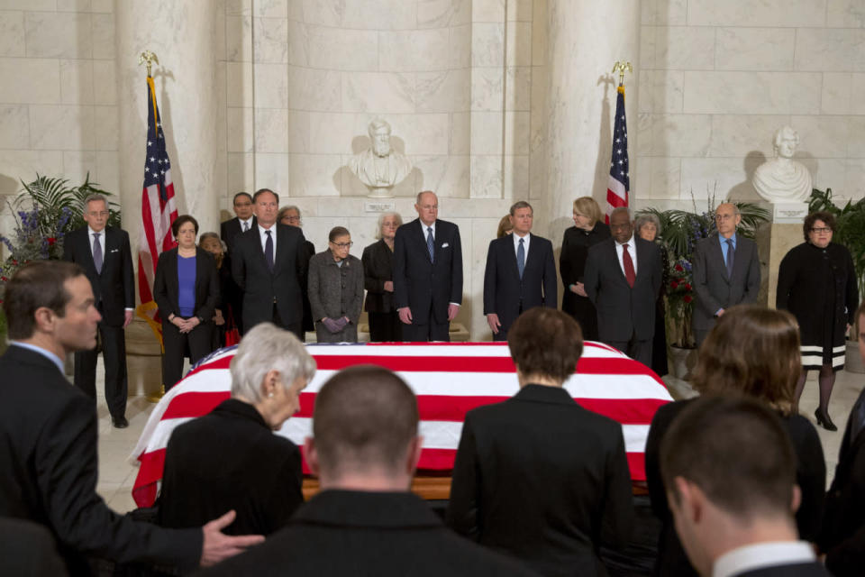 Family and justices pay respects