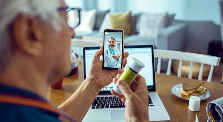 Retired man on televisit with his doctor