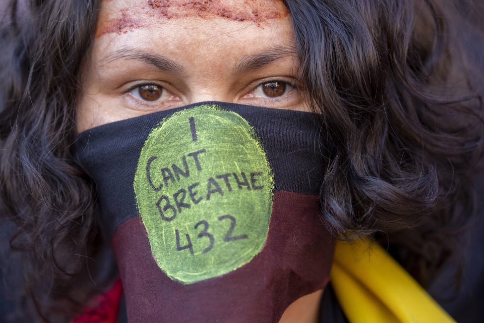 Protesters displayed the number 432, the number of aboriginal deaths in police custody since a 1991 Royal Commission into the matter. Source: AAP