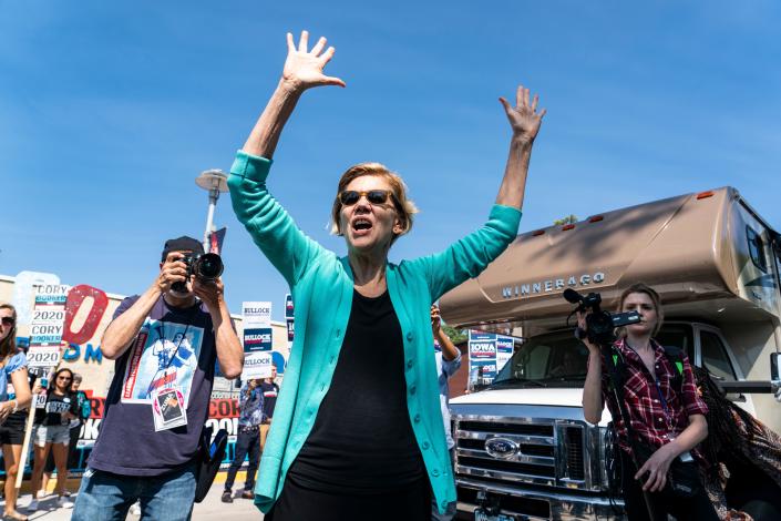 Sen. Elizabeth Warren greets supporters as she arrives at a rally outside the Wing Ding Dinner in Clear Lake, Iowa, last week. (Photo by Alex Edelman/ AFP/Getty Images)