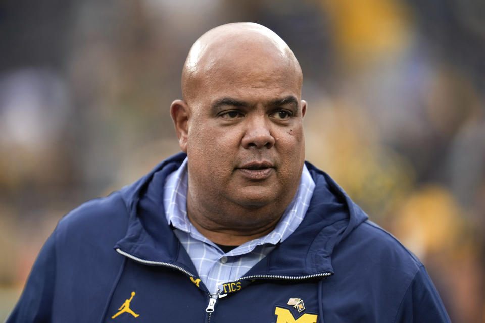FILE - Michigan athletic director Warde Manuel watches in the second half of an NCAA college football game against UNLV in Ann Arbor, Mich., Saturday, Sept. 9, 2023. Athletic departments across the country have wrestled with the ever-changing Name, Image and Likeness landscape that has ushered in a new era since the way was cleared in 2021 for college athletes to cash in. Michigan athletic director Warde Manuel says it’s the right time to bring in a company that has had three years to develop strategies and NIL connections. (AP Photo/Paul Sancya, File)