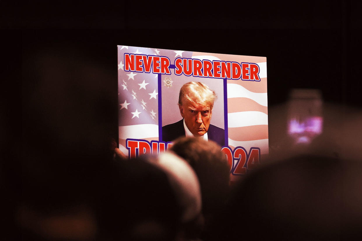 Donald Trump Mugshot Poster Supporters Justin Sullivan/Getty Images