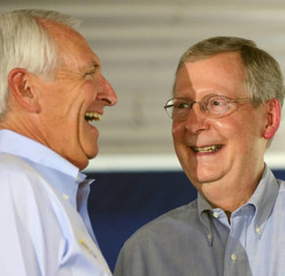 Gov. Steve Beshear, left, a Democrat, and U.S. Senator Mitch McConnell, a Republican, shared a laugh before the speaking began Saturday at the 130th Fancy Farm Picnic in Graves County.