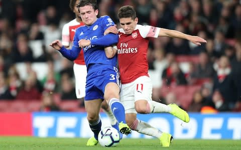 Lucas Torreira (right) challenges Ben Chilwell - Credit: getty images