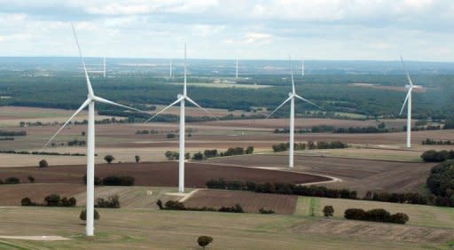 Wind turbines between Poitiers and Angouleme in France. Nearly 200 nations launched a fresh round of United Nations climate talks in Doha on Monday faced with appeals for urgency in their efforts to reduce Earth-warming greenhouse gas emissions