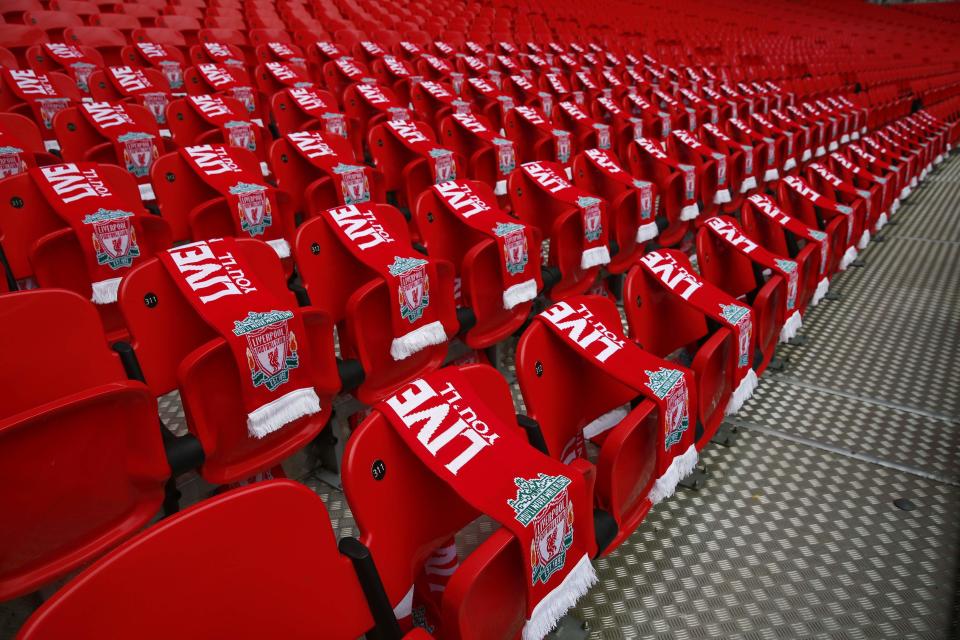 Ninety-six Liverpool scarves are placed on seats on the 25th anniversary of the Hillsborough disaster before the FA Cup semi-final soccer match between Arsenal and Wigan Athletic at Wembley Stadium in London April 12, 2014. Every senior match in England will kick-off seven minutes later than normal this weekend as soccer marks the 25th anniversary of the Hillsborough disaster, when 96 Liverpool fans died at an FA Cup semi-final against Nottingham Forest. REUTERS/Eddie Keogh (BRITAIN - Tags: ANNIVERSARY DISASTER SPORT SOCCER TPX IMAGES OF THE DAY)