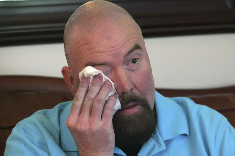 Tyler Thompson Sr., the father of Tyler Thompson, tears up during an interview Thursday, May 30, 2024, in West Jordan, Utah. A Utah family whose son has been implicated in a thwarted coup in Congo says they're unsure if he is still alive. U.S. officials have struggled to make contact with Tyler Thompson and two other Americans two weeks after their arrest. (AP Photo/Rick Bowmer)