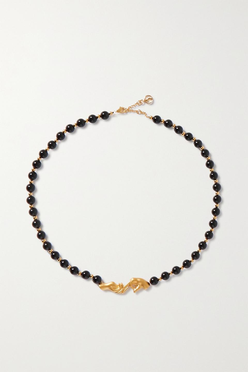 10) Les Mains Gold-Plated Onyx Necklace
