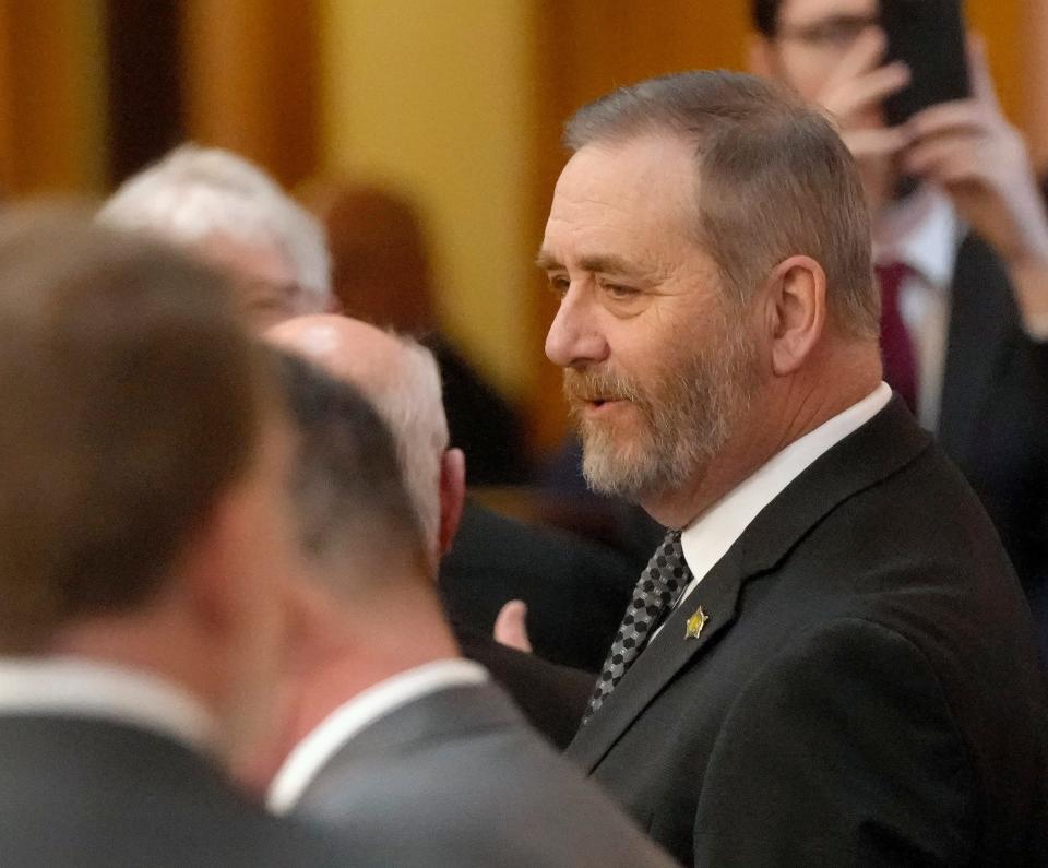 Ohio Attorney General Dave Yost mingles in the Ohio House chambers before Ohio Governor Mike DeWine gave his 2024 State of the State address at the Ohio Statehouse on April 10.