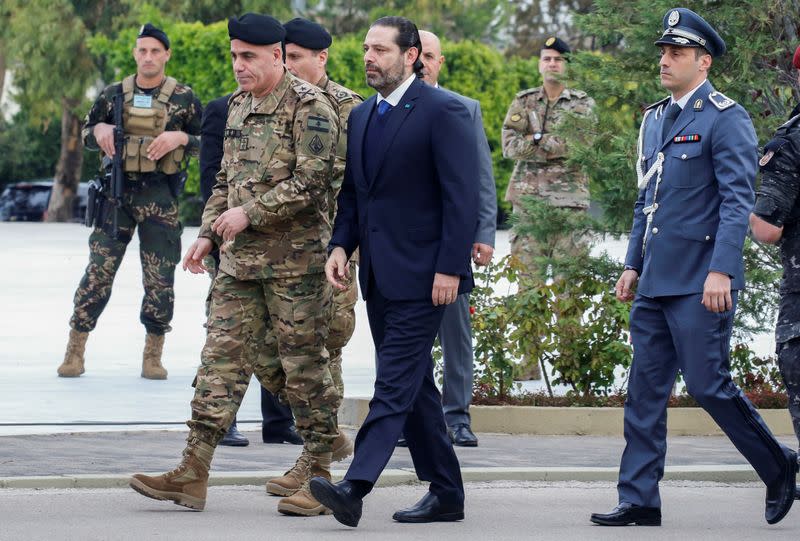 FILE PHOTO: Lebanon's caretaker Prime Minister Saad al-Hariri arrives to attend a military parade to mark the 76th anniversary of Lebanon's independence at the Ministry of Defense in Yarze