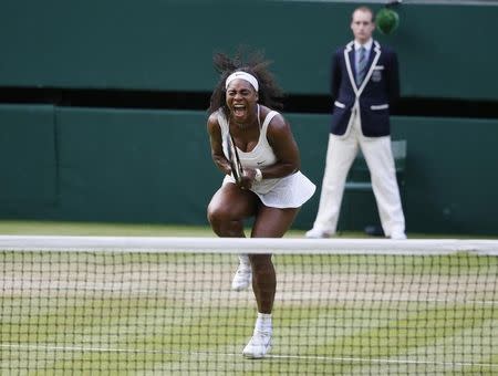 Serena Williams of the U.S.A. reacts during her match against Heather Watson of Britain at the Wimbledon Tennis Championships in London, July 3, 2015. REUTERS/Stefan Wermuth