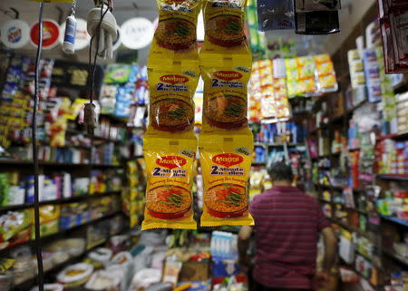 Packets of Maggi instant noodles are seen on display at a grocery store in Ahmedabad, India, June 3, 2015. REUTERS/Amit Dave