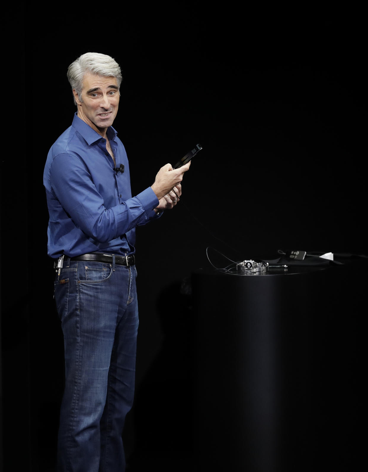 Craig Federighi, Apple’s senior vice president of software engineering, discusses features of the new iPhone X at the Steve Jobs Theater on the new Apple campus on Tuesday, Sept. 12, 2017, in Cupertino, Calif. (AP Photo/Marcio Jose Sanchez)