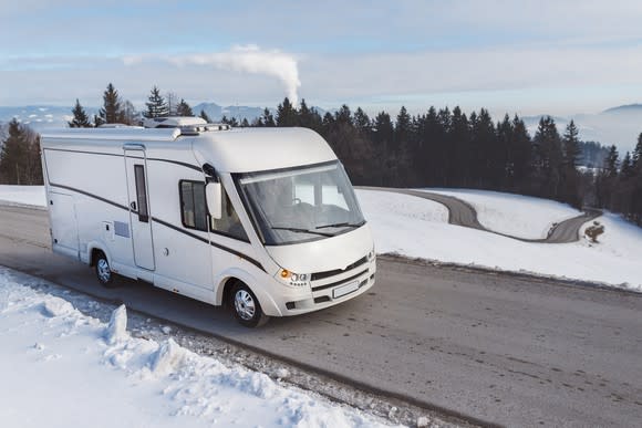 An RV driving down the road.