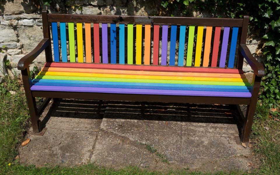 The bench was re-painted in rainbow colours in June 2021 - Colin Underhill / Alamy Stock Photo