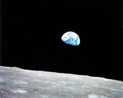 ‘Earthrise,’ captured by the Apollo 8 mission, was the first look at Earth from afar. <a href="https://www.nasa.gov/multimedia/imagegallery/image_feature_1249.html" rel="nofollow noopener" target="_blank" data-ylk="slk:NASA;elm:context_link;itc:0;sec:content-canvas" class="link ">NASA</a>