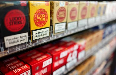 Packages with cigarettes are on display at a tobacco store in Hanau near Frankfurt, Germany, March 18, 2016. REUTERS/Kai Pfaffenbach