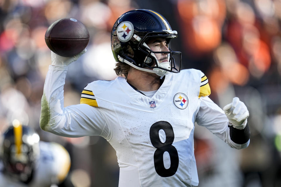 Pittsburgh Steelers quarterback Kenny Pickett (8) passes in the pocket against the Cleveland Browns during the second half of an NFL football game, Sunday, Nov. 19, 2023, in Cleveland. (AP Photo/Sue Ogrocki)