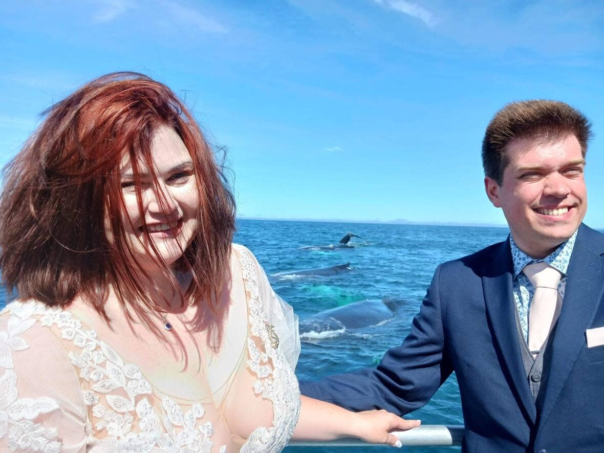 Tiffany Adams and her husband had a unique ocean backdrop for their wedding. They chartered a whale-watching boat for a surprise ceremony. (Submitted by Tiffany Adams - image credit)