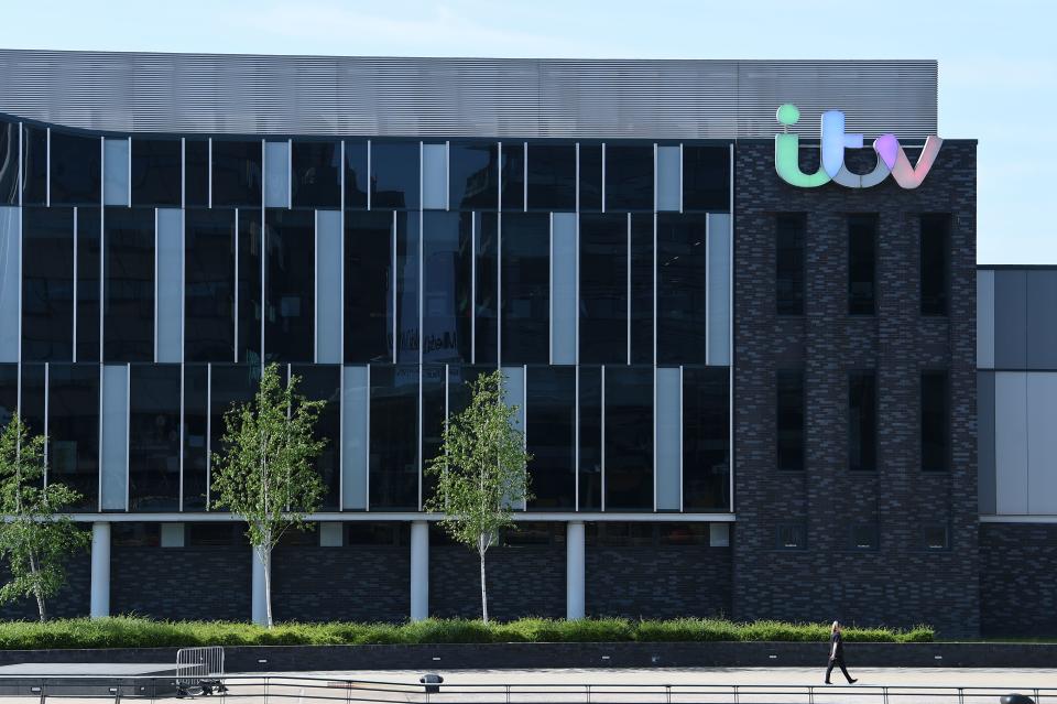 A picture shows the logo of broadcaster ITV at their MediaCityUK studios in Salford, Greater Manchester, northwest England, on May 14, 2019. - All episodes of a popular British talk show have been pulled from the internet and filming has been suspended after the reported suicide of a former guest Tuesday. Broadcaster ITV pulled its most popular daytime show "The Jeremy Kyle Show" off air indefinitely following the death of 63-year-old Steve Dymond, a week after he appeared on an episode. (Photo by Paul ELLIS / AFP)        (Photo credit should read PAUL ELLIS/AFP/Getty Images)
