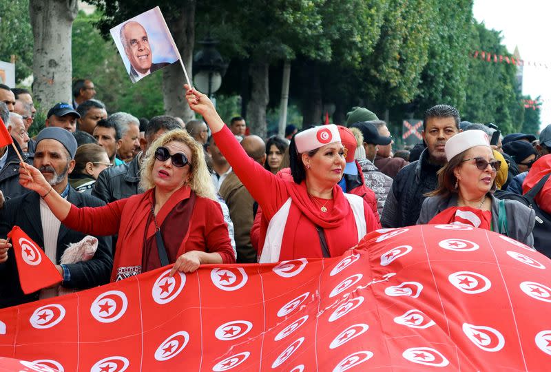 Supporters of Tunisia's President Kais Saied attend a rally in Tunis