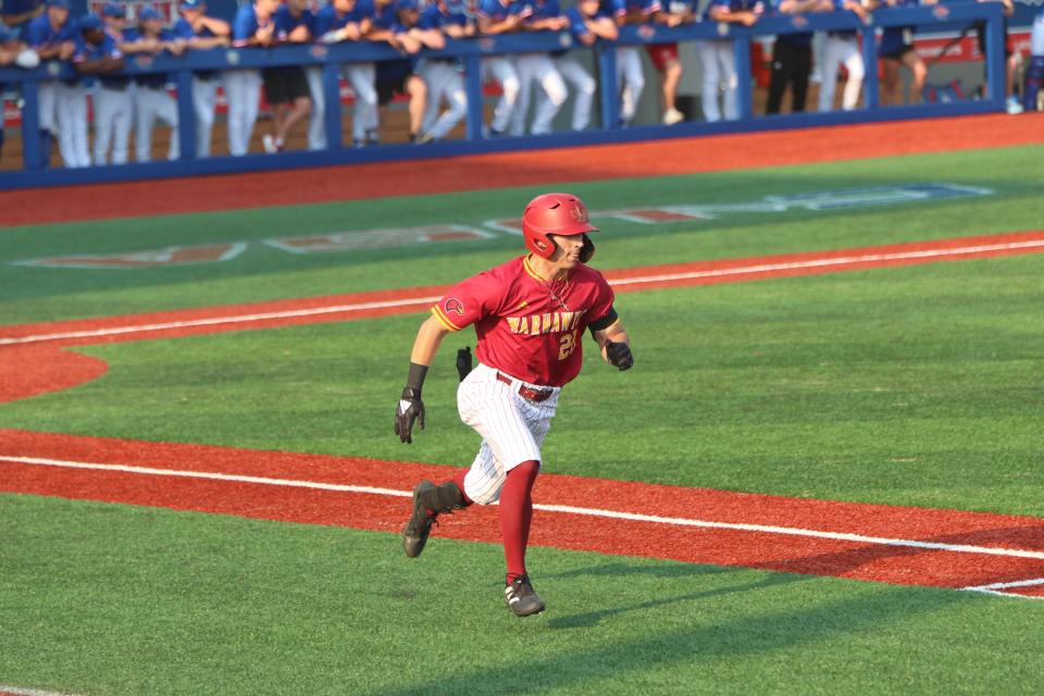 Mason Holt hustles to first in the 11-5 loss to Louisiana Tech on May 3.