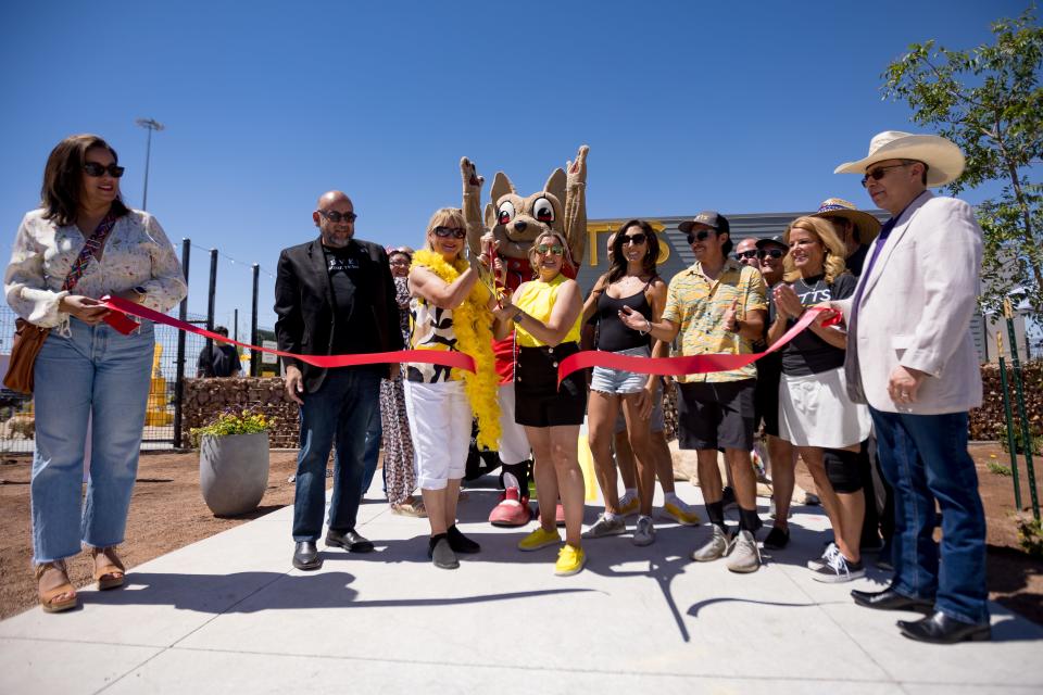 Owners mother-daughter duo, April Mendoza and Pamela Mendoza-Anderson, center, cut a ribbon at the MUTTS Canine Cantina grand opening was held on Saturday, May 18, 2024, in the Montecillo community at West El Paso.