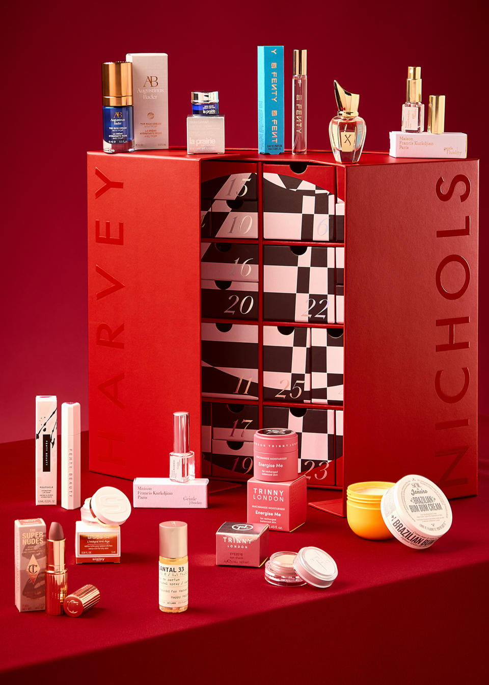 It is housed in a luxury red box with a checkerboard bauble design on the inside. (Harvey Nichols)