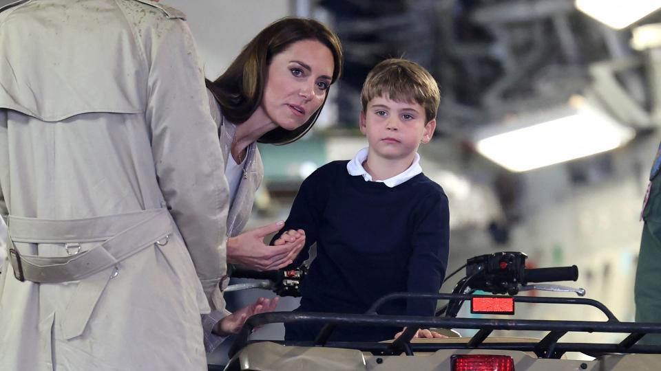 mother holding son's hand 