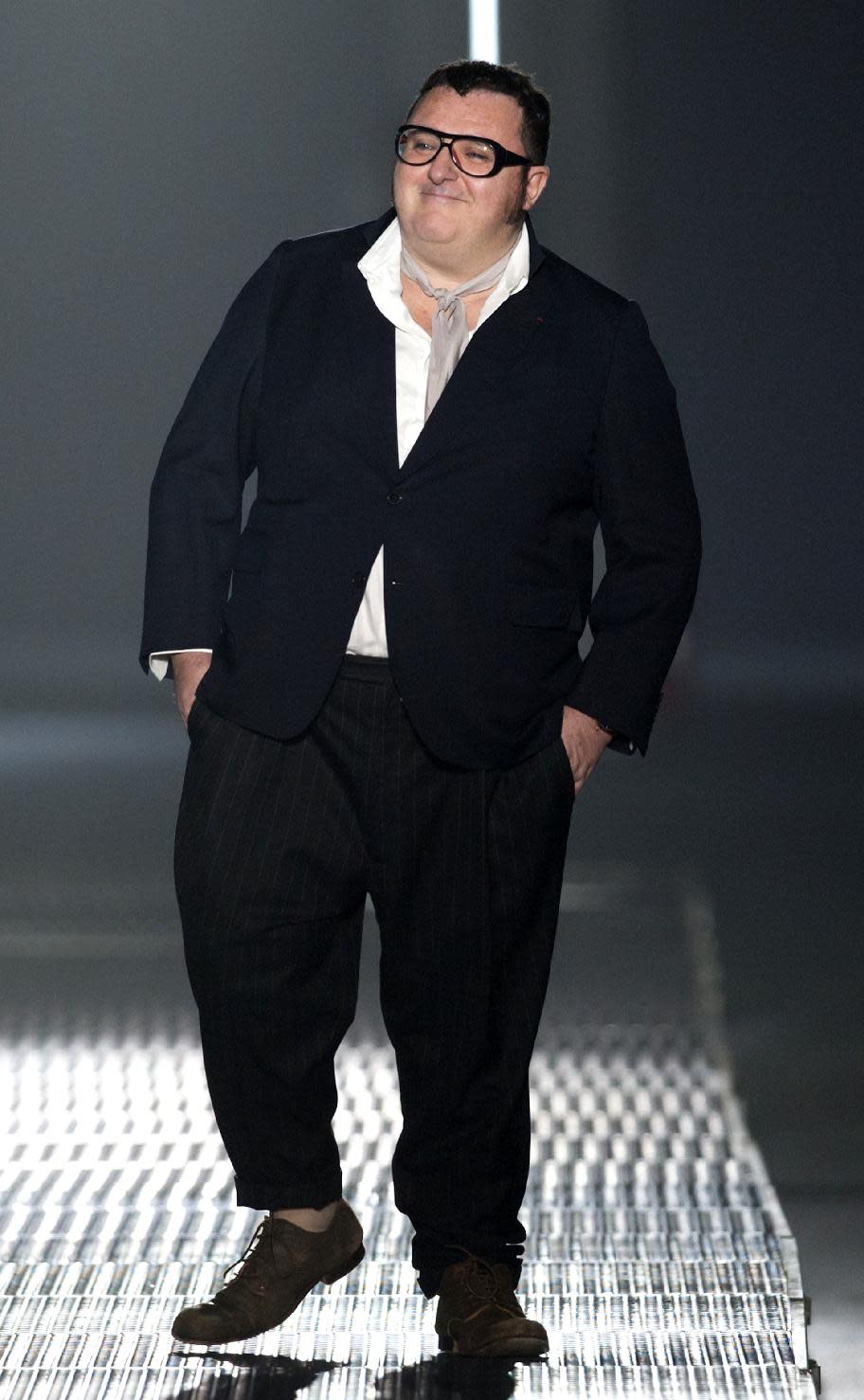 FILE - This July 1, 2012 file photo shows Israeli fashion designer Alber Elbaz at the end of the show for his Men's Spring-Summer 2013 collection, for Lanvin fashion house in Paris, France. Makeup powerhouse Lancome announced Monday, Jan. 14, 2013 that Elbaz will have a line of cosmetics, Lancome x Alber Elbaz, launching in June. (AP Photo/Jacques Brinon, file)