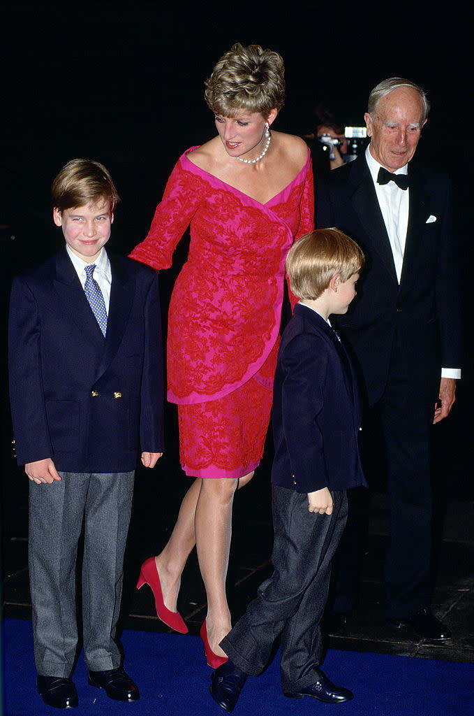 Prince William had Princess Charlotte&#39;s same cheeky grin as a child, pictured with his mother and brother in 1991. (Photo by Tim Graham Photo Library via Getty Images)