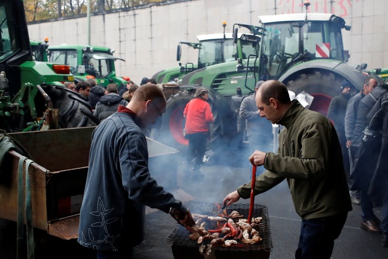 French farmers block the ring road with their tractors during a day of protest in Paris
