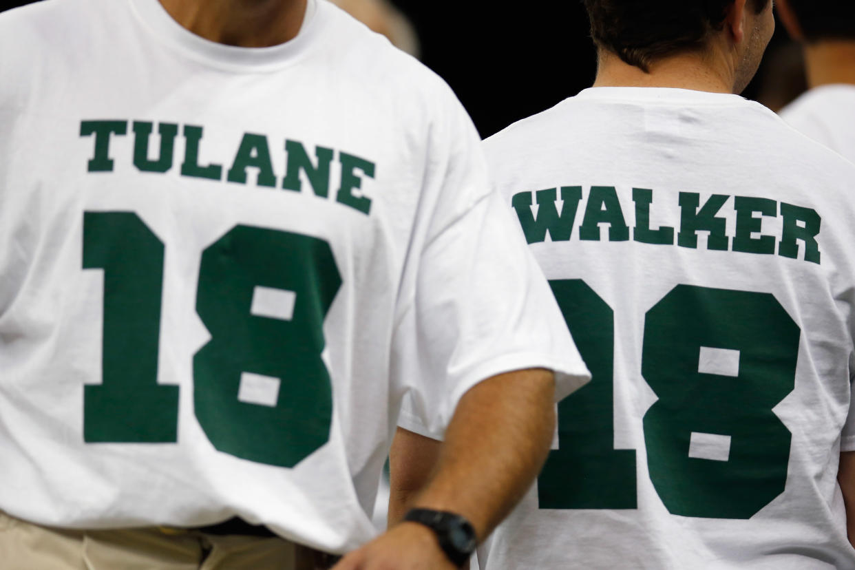 Members of the Tulane Green Wave football team wear the number 18 showing support for injured player Devon Walker at the Louisiana Superdome on September 22, 2012 in New Orleans, Louisiana. (Photo by Chris Graythen/Getty Images)