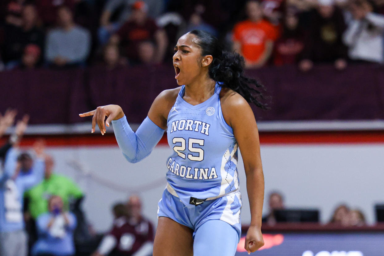 BLACKSBURG, VIRGINIA - FEBRUARY 25: Deja Kelly #25 of the North Carolina Tar Heels reacts in the first half during a game against the Virginia Tech Hokies  at Cassell Coliseum on February 25, 2024 in Blacksburg, Virginia. (Photo by Ryan Hunt/Getty Images)