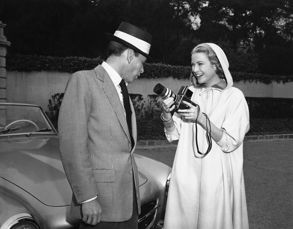 Grace Kelly with Frank Sinatra on the set of 'High Society' on Jan. 19, 1956. 