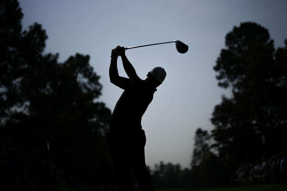 Kyoung-Hoon Lee, of South Korea, watches his tee shot on the ninth hole during a practice round for the Masters golf tournament at Augusta National Golf Club on Wednesday, April 5, 2023, in Augusta, Ga. (AP Photo/Matt Slocum)