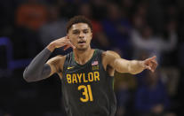 Baylor guard MaCio Teague (31) celebrates after making a basket against the Florida during the first half of an NCAA college basketball game Saturday, Jan. 25, 2020, in Gainesville, Fla. (AP Photo/Matt Stamey)