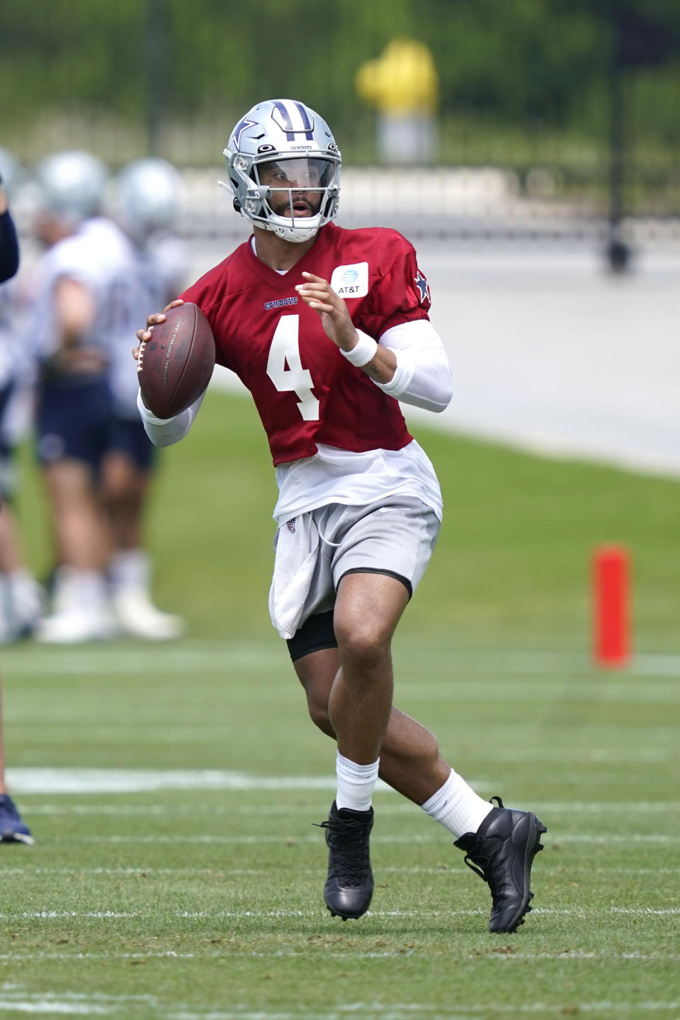 Dallas Cowboys quarterback Dak Prescott looks to pass during an NFL football team practice Tuesday, June 8, 2021, in Frisco, Texas. (AP Photo/LM Otero)