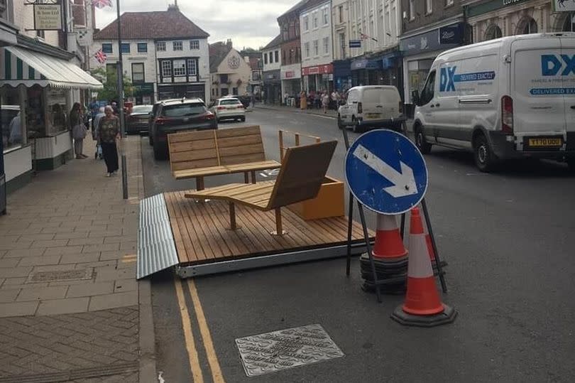 A petition in favour of keeping cafÃ© culture-style seating in Louthâ€™s Cornmarket has been launched while the installation of new â€œparkletsâ€ on the townâ€™s High Street has caused a stir. Mike Bristow, from Larders Coffee House, launched the change.org petition to â€œKeep The Cornmarket Cafe Culture in Louthâ€ on Tuesday and has received around 200 signatures in that time.
However, Lincolnshire County Councilâ€™s first parklet, which was installed on Mercer Row last night has sparked hundreds of commenters on social media with many already raising safety concerns and worries about the visual impact â€“ a second one is due to be installed on Wednesday, August 24.

Caption: Newly-installed seating on Mercer Row, Louth