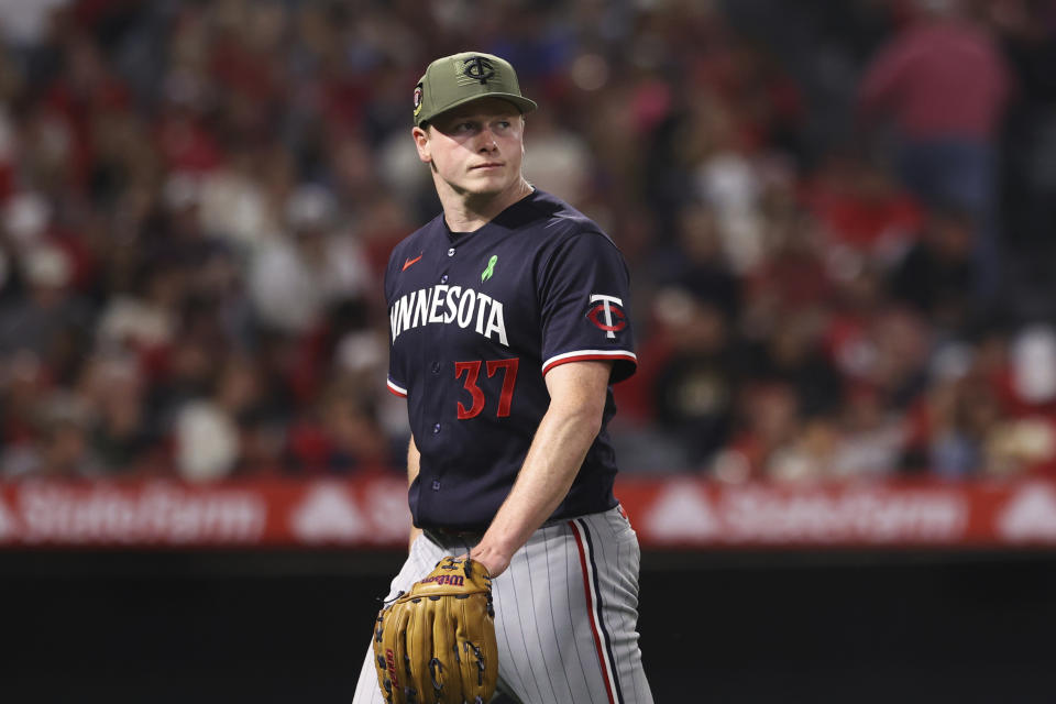 Minnesota Twins starting pitcher Louie Varland (37) leaves the game during the sixth inning of a baseball game against the Los Angeles Angels in Anaheim, Calif., Saturday, May 20, 2023. (AP Photo/Jessie Alcheh)