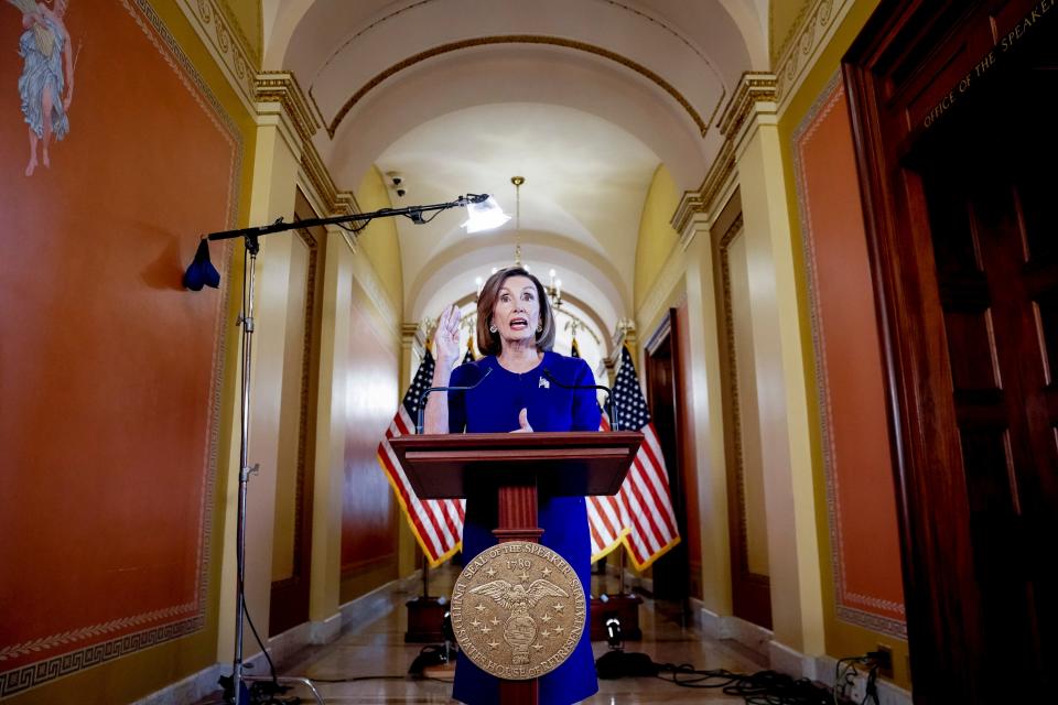 House Speaker Nancy Pelosi, D-Calif., reads a statement announcing a formal impeachment inquiry into President Donald Trump on Sept. 24.